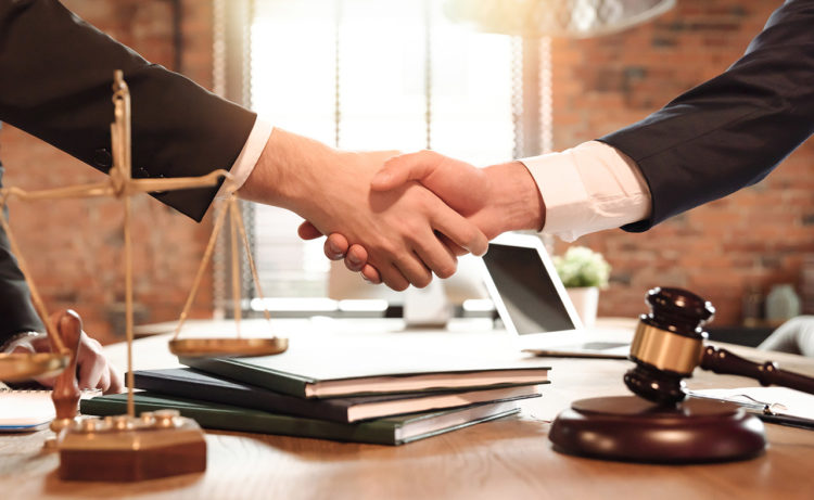 hands for corporate law 750x461 1